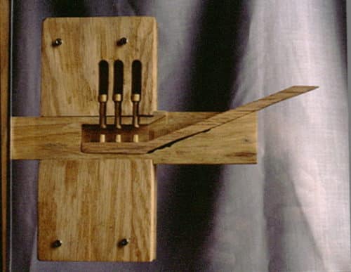 image of an ancient wooden Egyptian pin tumbler type lock